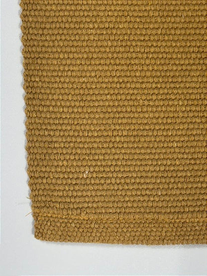 Tapetinho de linha liso mostarda 50 x 80 cm